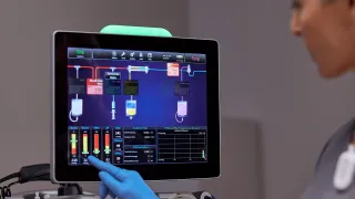 Doctor attending PrisMax screen