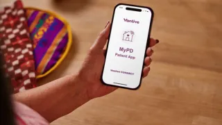 Woman looking at phone screen of MyPD App