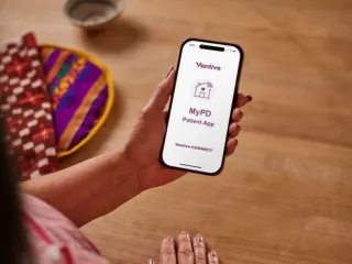 Woman looking at phone screen of MyPD App